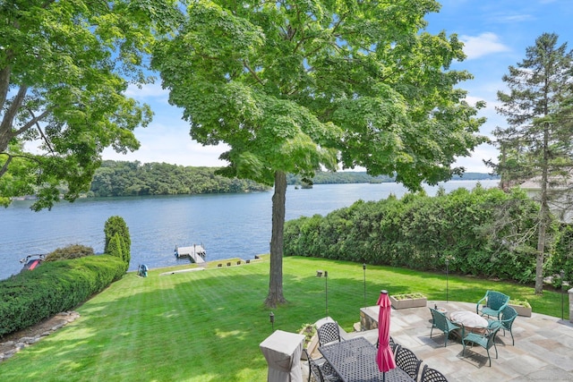 35 Knollcrest Rd, New Fairfield, CT 06812 - view of grassy yard with a patio area, a water view, and outdoor dining area