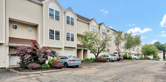 2390 State St Apt 6E, Hamden, CT 06517 - view of property featuring a residential view and an attached garage