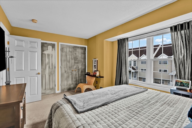 2390 State St Apt 6E, Hamden, CT 06517 - carpeted bedroom featuring multiple closets