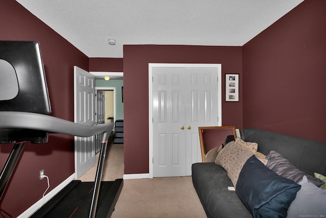 2390 State St Apt 6E, Hamden, CT 06517 - workout room with carpet flooring and baseboards