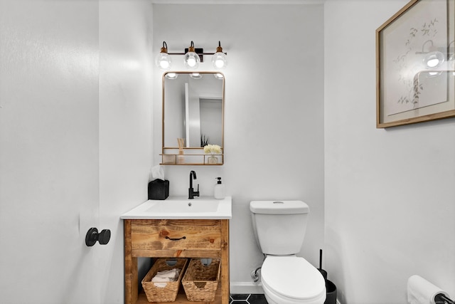 124 High Path Rd Unit 124, Windsor, CT 06095 - bathroom with toilet, vanity, tile patterned floors, and baseboards
