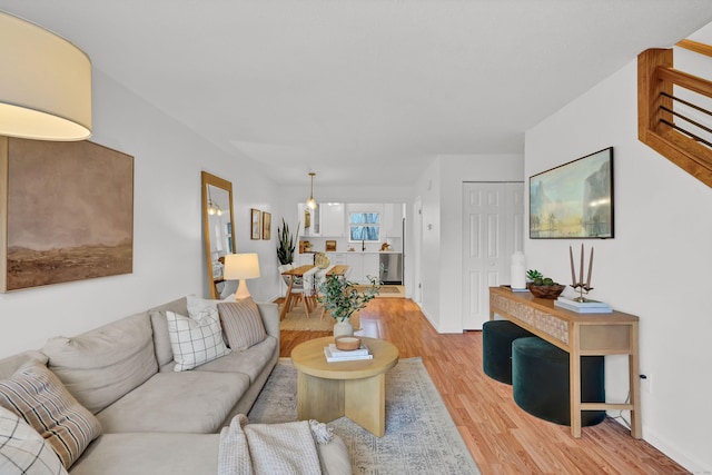 124 High Path Rd Unit 124, Windsor, CT 06095 - living room featuring light wood-style flooring and baseboards