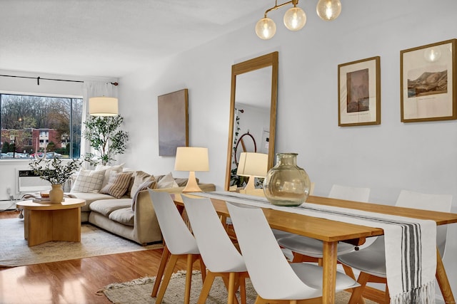 124 High Path Rd Unit 124, Windsor, CT 06095 - dining area featuring wood finished floors and a wall unit AC
