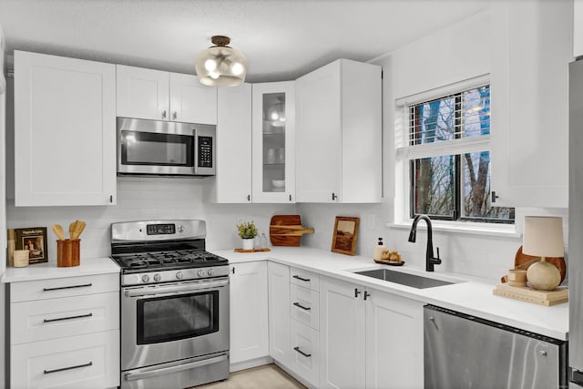124 High Path Rd Unit 124, Windsor, CT 06095 - kitchen featuring stainless steel appliances, a sink, and white cabinetry