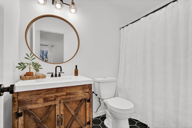 124 High Path Rd Unit 124, Windsor, CT 06095 - bathroom with vanity, toilet, and tile patterned floors