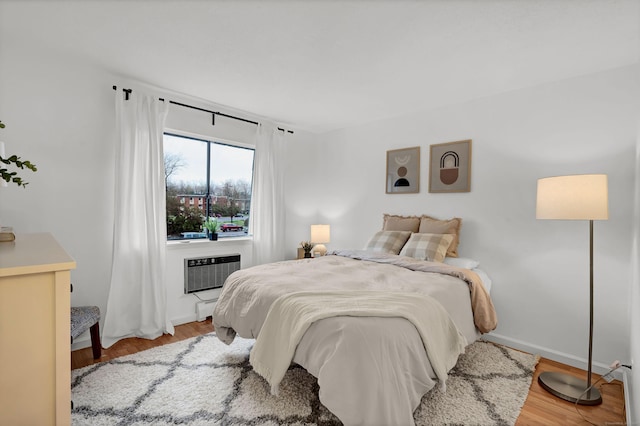 124 High Path Rd Unit 124, Windsor, CT 06095 - bedroom with wood finished floors and an AC wall unit