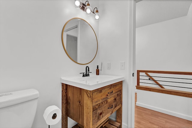 124 High Path Rd Unit 124, Windsor, CT 06095 - bathroom with vanity, toilet, and wood finished floors