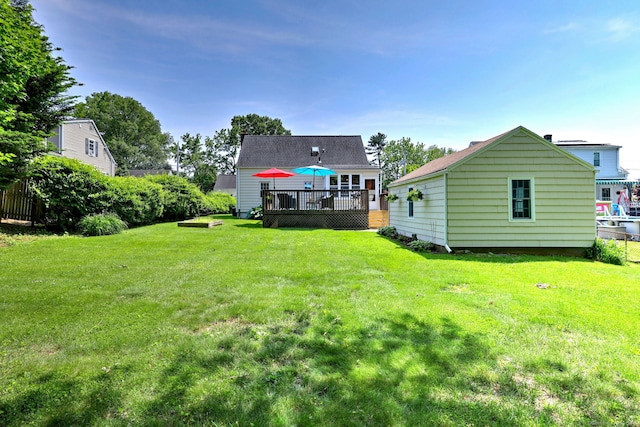 84 Kenwood Ave, Stratford, CT 06614 - rear view of property with a deck and a lawn