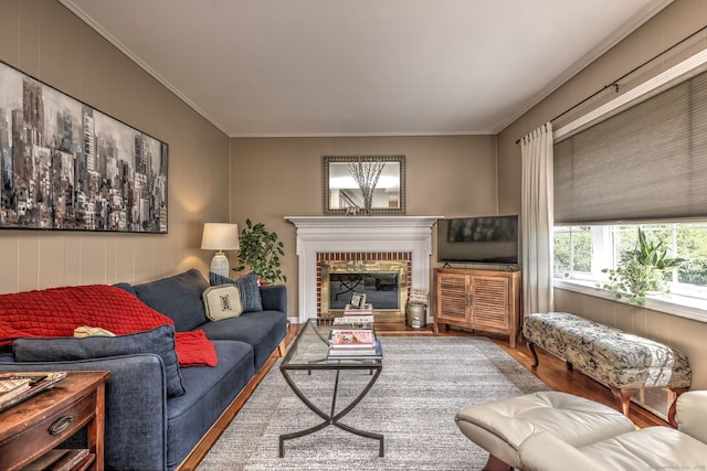 84 Kenwood Ave, Stratford, CT 06614 - living area with wood finished floors, ornamental molding, and a fireplace