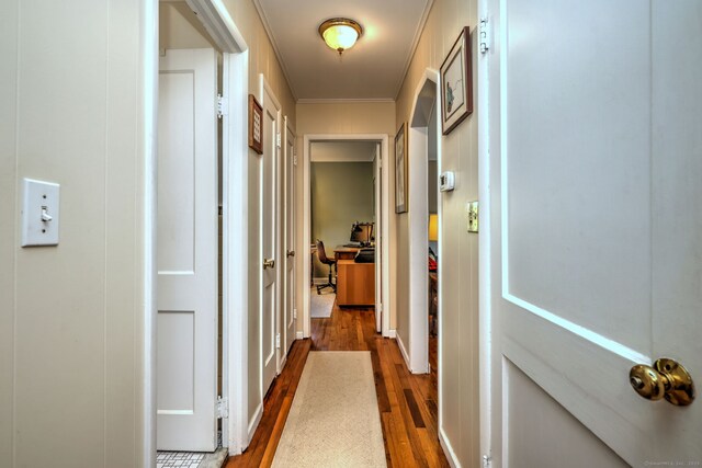 84 Kenwood Ave, Stratford, CT 06614 - hallway featuring dark wood-style flooring and ornamental molding