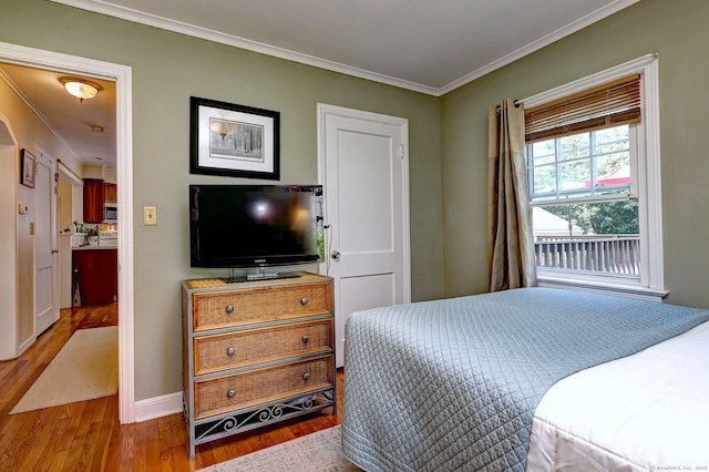 84 Kenwood Ave, Stratford, CT 06614 - bedroom with ornamental molding and wood finished floors