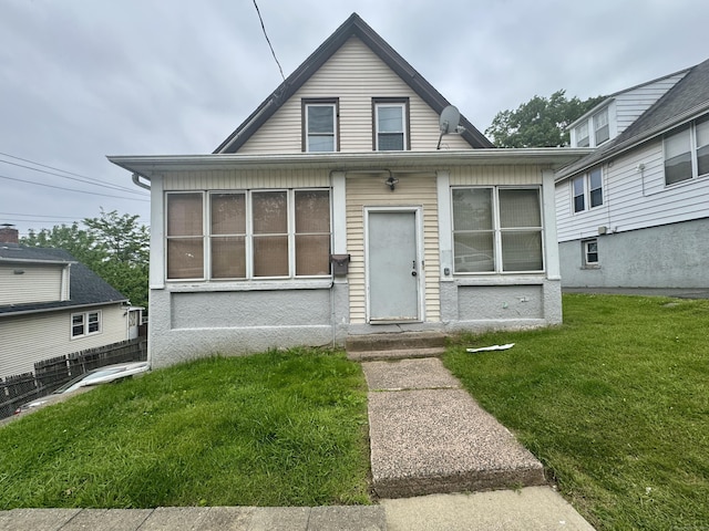 28 Terrace Ave, West Haven, CT 06516 - bungalow-style home featuring a front lawn
