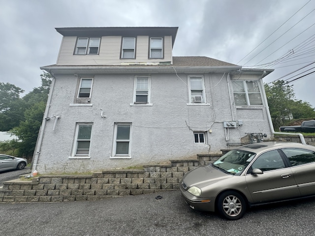 28 Terrace Ave, West Haven, CT 06516 - view of side of home featuring stucco siding