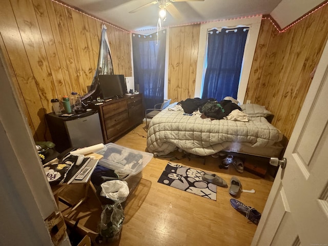 28 Terrace Ave, West Haven, CT 06516 - bedroom with wood walls, light wood-style floors, and a ceiling fan