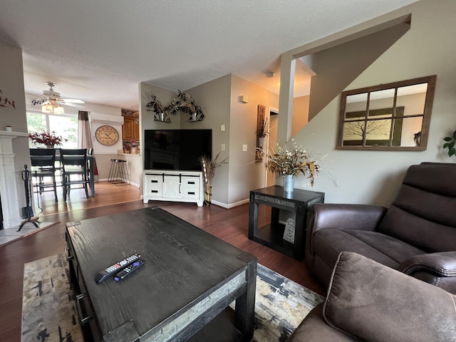 925 Oronoke Rd Unit 36G, Waterbury, CT 06708 - living room featuring dark wood-style flooring and ceiling fan