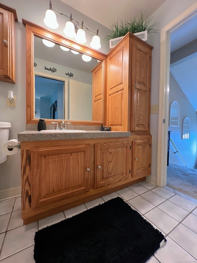 925 Oronoke Rd Unit 36G, Waterbury, CT 06708 - bathroom featuring toilet, tile patterned flooring, vanity, and baseboards