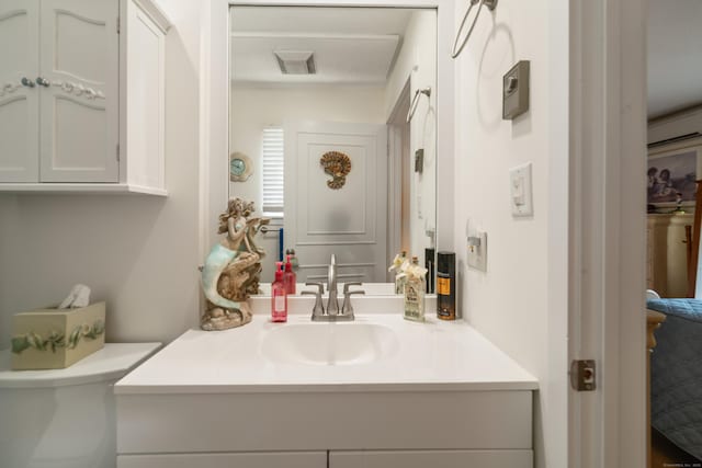 543 Heritage Vlg Unit A, Southbury, CT 06488 - bathroom with vanity and toilet