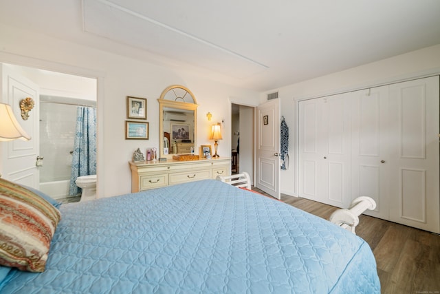 543 Heritage Vlg Unit A, Southbury, CT 06488 - bedroom featuring dark wood finished floors, ensuite bathroom, and a closet