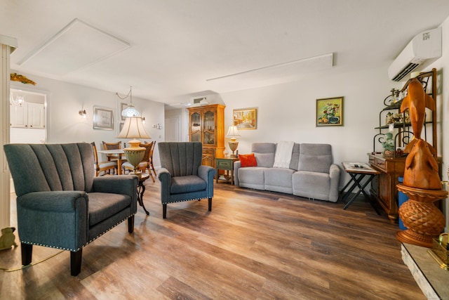 543 Heritage Vlg Unit A, Southbury, CT 06488 - living room featuring a wall mounted AC and wood finished floors