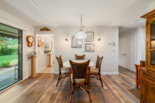 543 Heritage Vlg Unit A, Southbury, CT 06488 - dining space with wood finished floors and baseboards