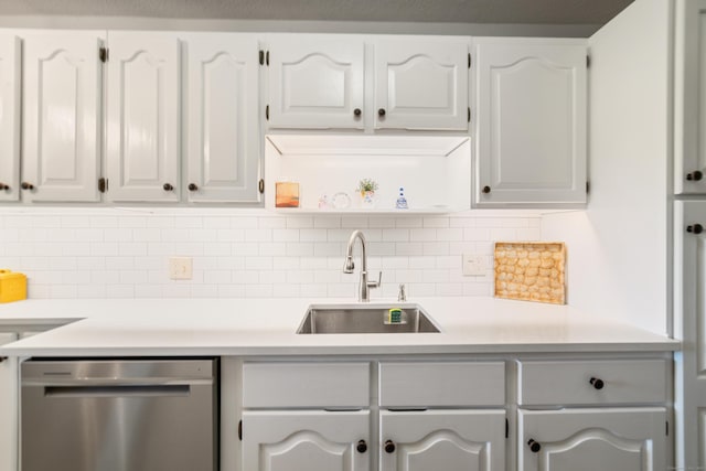 543 Heritage Vlg Unit A, Southbury, CT 06488 - kitchen with stainless steel dishwasher, tasteful backsplash, and light countertops