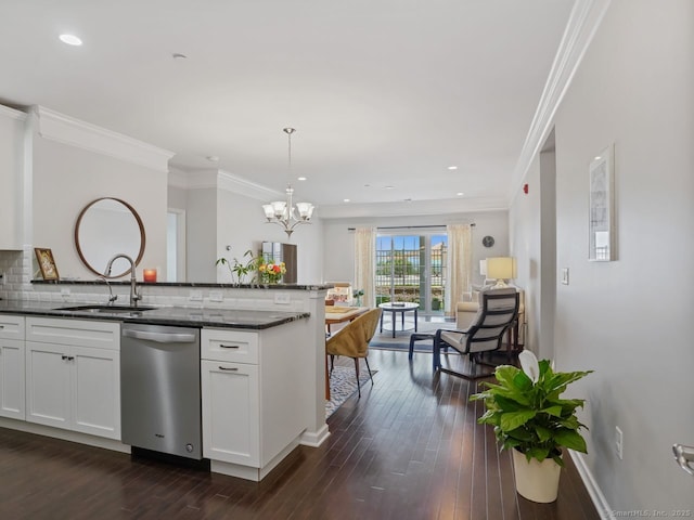 302 Center Meadow Ln Unit 302, Danbury, CT 06810 - kitchen featuring stainless steel dishwasher, open floor plan, dark wood-type flooring, tasteful backsplash, and a chandelier