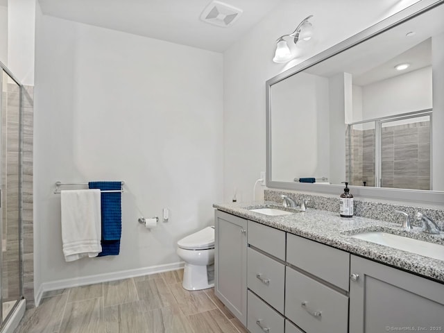 302 Center Meadow Ln Unit 302, Danbury, CT 06810 - bathroom featuring double vanity and a stall shower