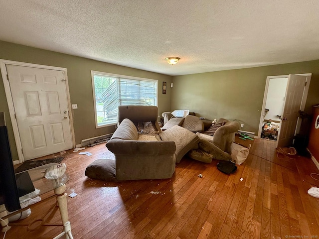 7 Emerson St, Bloomfield, CT 06002 - living room featuring a textured ceiling and hardwood / wood-style flooring