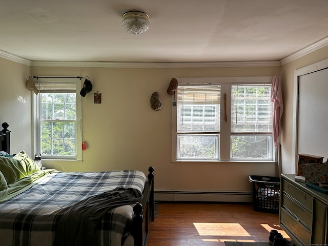 278 Scoville Hill Rd, Harwinton, CT 06791 - bedroom with a baseboard heating unit, dark wood-style floors, and crown molding