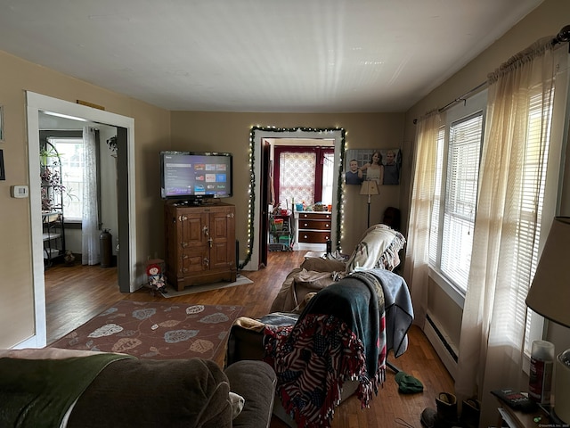 278 Scoville Hill Rd, Harwinton, CT 06791 - living room featuring a baseboard radiator, healthy amount of natural light, and wood finished floors