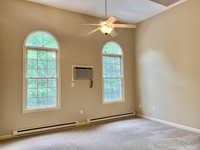 350 Bristol St Apt A3, Waterbury, CT 06708 - carpeted spare room featuring baseboard heating, a wall mounted AC, a ceiling fan, and baseboards