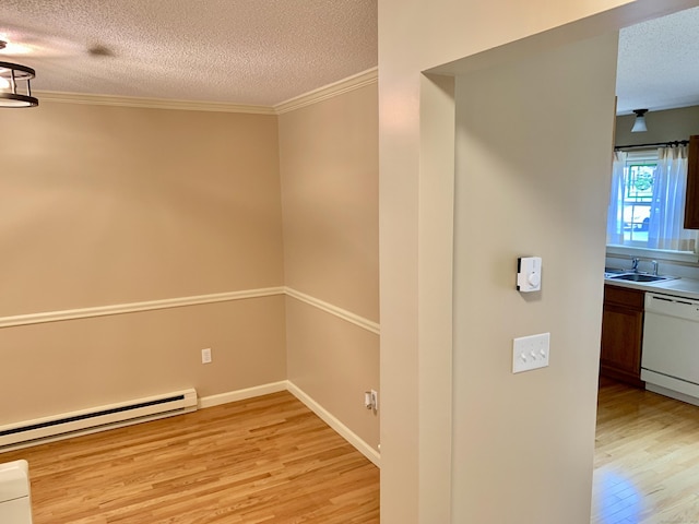 350 Bristol St Apt A3, Waterbury, CT 06708 - corridor with light wood finished floors, a baseboard radiator, a textured ceiling, a sink, and crown molding