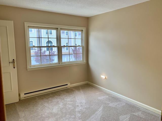 350 Bristol St Apt A3, Waterbury, CT 06708 - carpeted empty room with a baseboard radiator, plenty of natural light, a textured ceiling, and baseboards