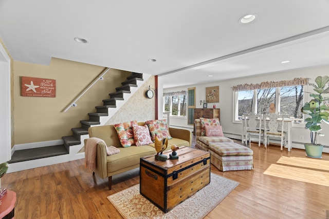 73 Lake Shore Dr, East Haddam, CT 06415 - living area with stairs, wood finished floors, recessed lighting, and a baseboard radiator