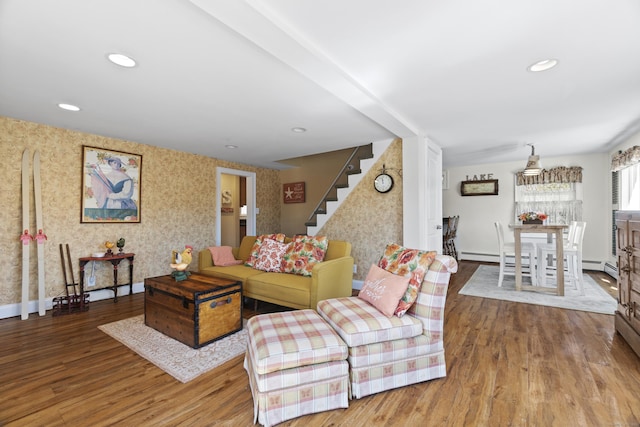 73 Lake Shore Dr, East Haddam, CT 06415 - living area featuring wood finished floors, stairway, wallpapered walls, baseboards, and baseboard heating