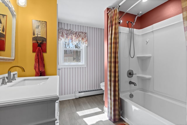 73 Lake Shore Dr, East Haddam, CT 06415 - full bathroom with a baseboard heating unit, wood finished floors, vanity, toilet, and shower / bath combo