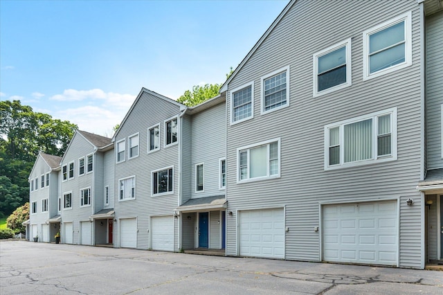 129 Knowles Ave Unit 129, Middletown, CT 06457 - view of building exterior with an attached garage