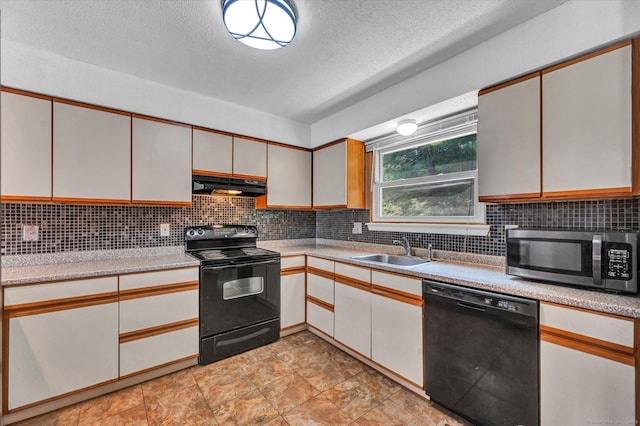129 Knowles Ave Unit 129, Middletown, CT 06457 - kitchen with black appliances, under cabinet range hood, a sink, light countertops, and a textured ceiling