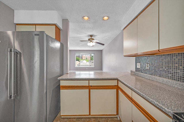 129 Knowles Ave Unit 129, Middletown, CT 06457 - kitchen featuring freestanding refrigerator, backsplash, a ceiling fan, a textured ceiling, and recessed lighting