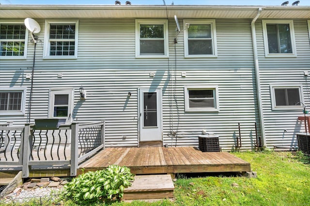 129 Knowles Ave Unit 129, Middletown, CT 06457 - rear view of house with a deck, a yard, and central AC unit