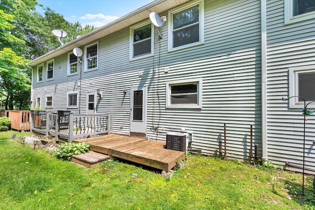129 Knowles Ave Unit 129, Middletown, CT 06457 - rear view of house with a wooden deck, a yard, and central air condition unit