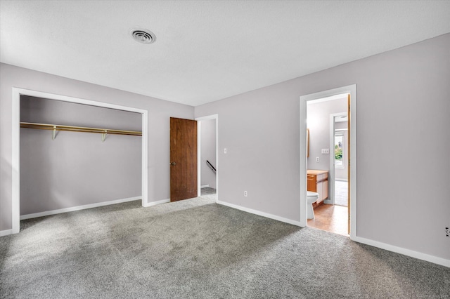 129 Knowles Ave Unit 129, Middletown, CT 06457 - unfurnished bedroom with carpet floors, baseboards, a closet, and ensuite bathroom