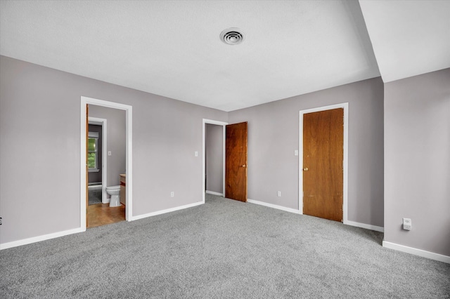 129 Knowles Ave Unit 129, Middletown, CT 06457 - unfurnished bedroom featuring carpet flooring, baseboards, and ensuite bathroom