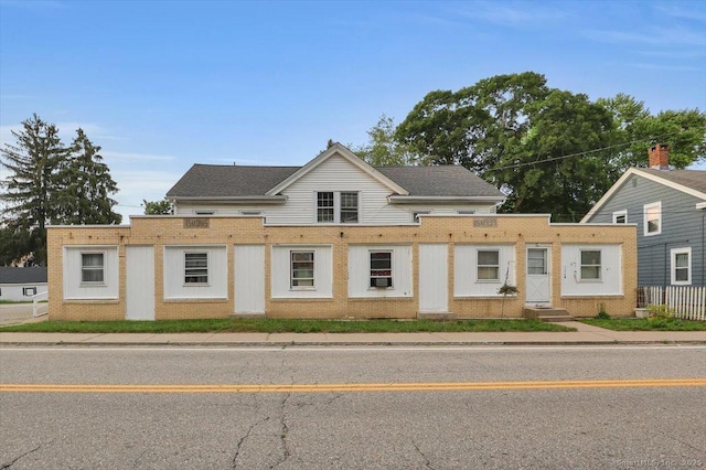 124 Main St, Sprague, CT 06330 - view of front facade featuring brick siding and entry steps