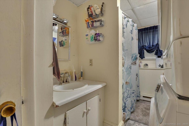 124 Main St, Sprague, CT 06330 - full bathroom with baseboard heating, vanity, a drop ceiling, and a shower with curtain