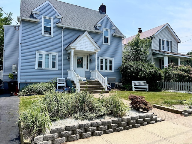 475 Lighthouse Rd, New Haven, CT 06512 - victorian home featuring a chimney and roof with shingles
