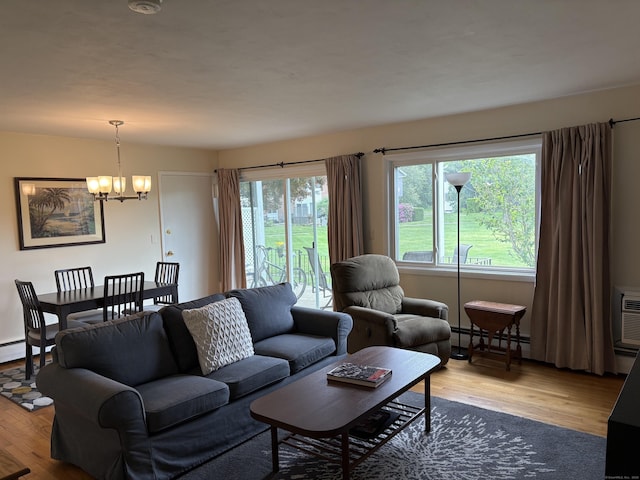 80 County St Apt 7K, Norwalk, CT 06851 - living room featuring a chandelier, wood finished floors, and baseboard heating