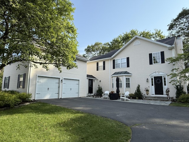 11 Pequot Ct Unit 11, Monroe, CT 06468 - view of front of home with driveway and a front yard