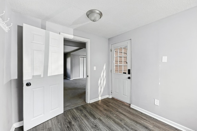 103 Anthony St, New Haven, CT 06515 - empty room featuring dark wood finished floors and a textured ceiling