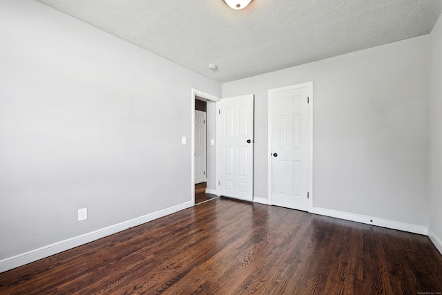 103 Anthony St, New Haven, CT 06515 - unfurnished bedroom featuring wood finished floors and a textured ceiling